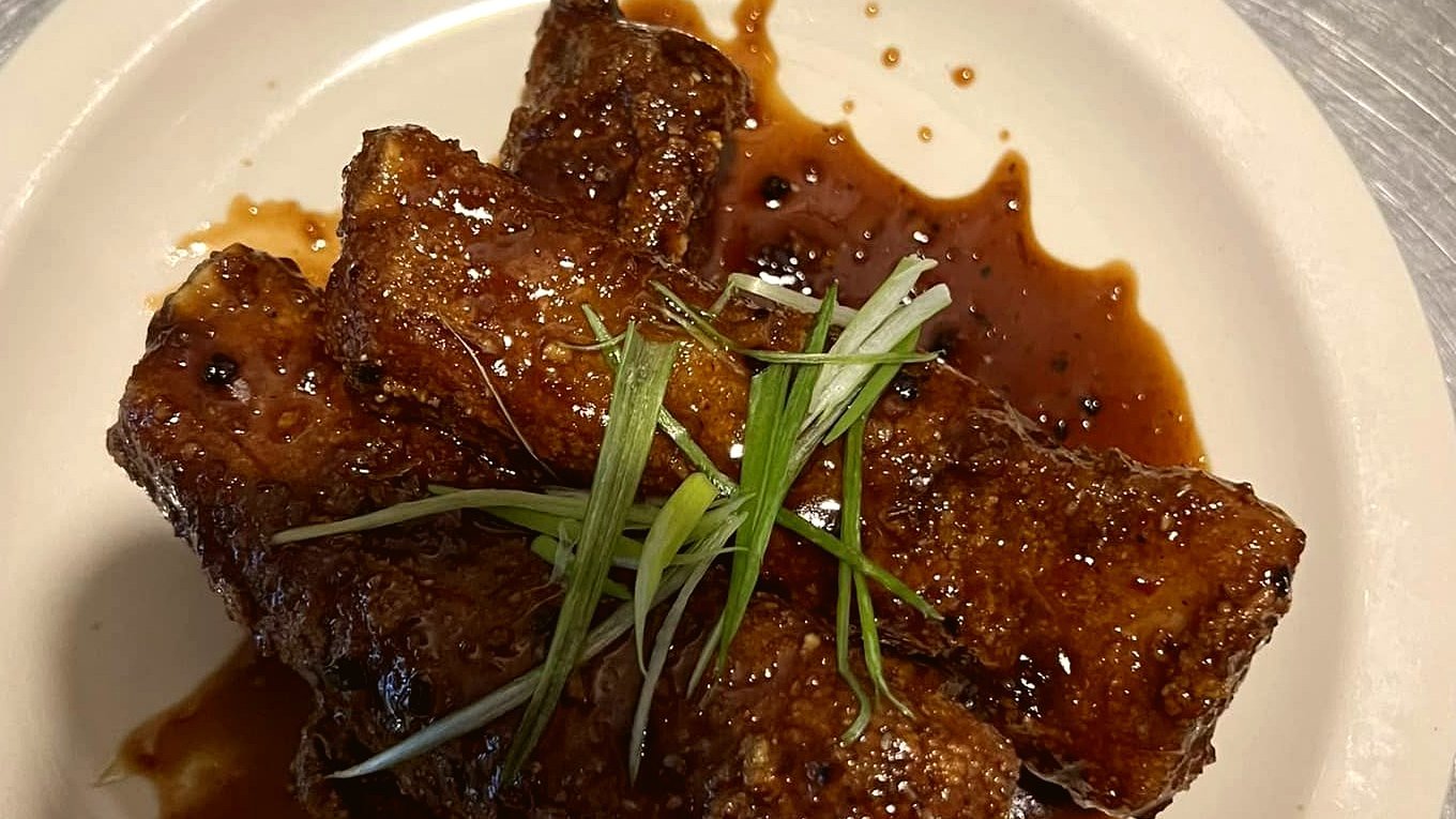 Glazed char-grilled pork bites