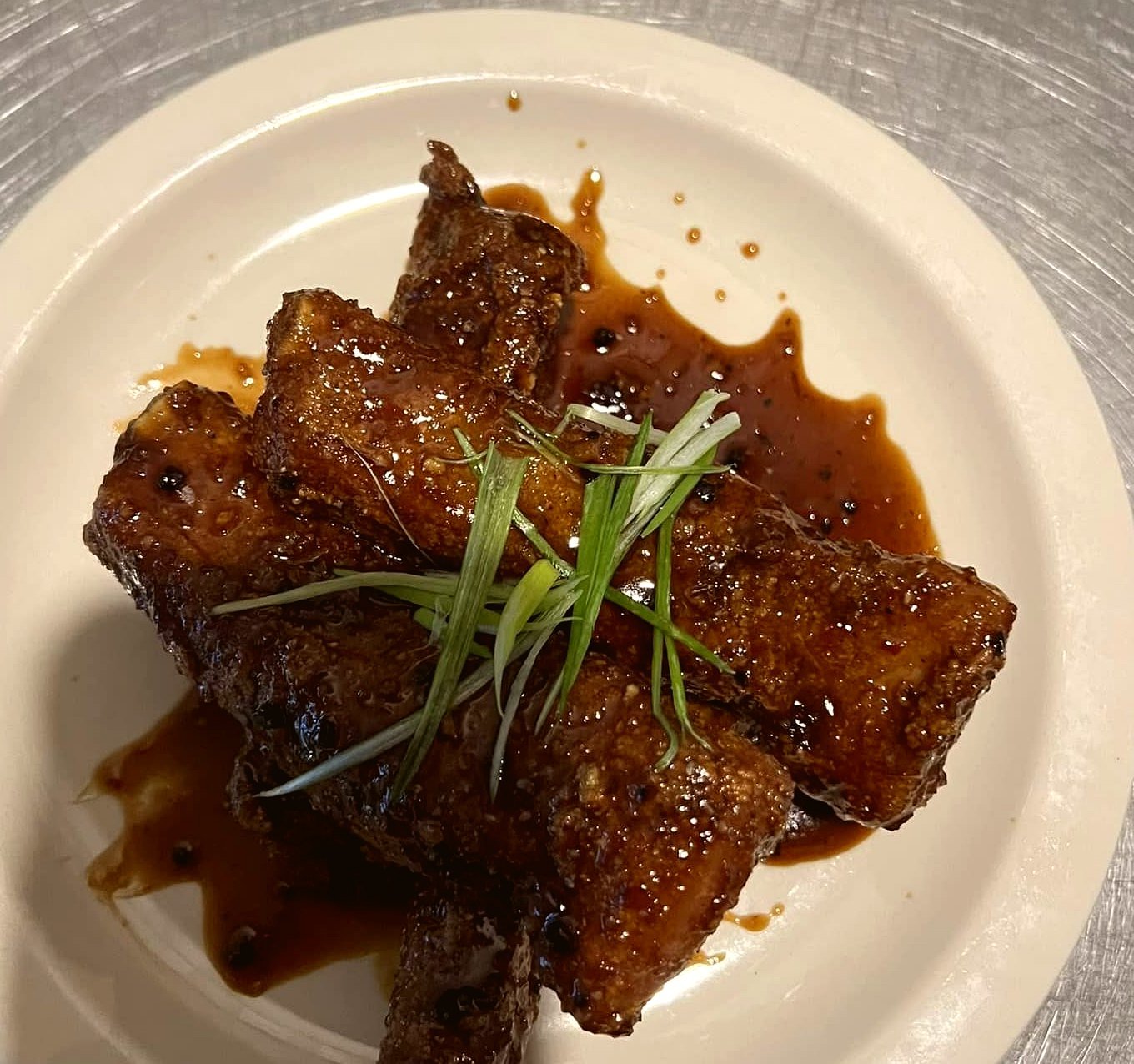 Glazed char-grilled pork bites